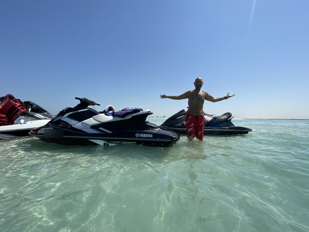 Jet skis in clear shallow water