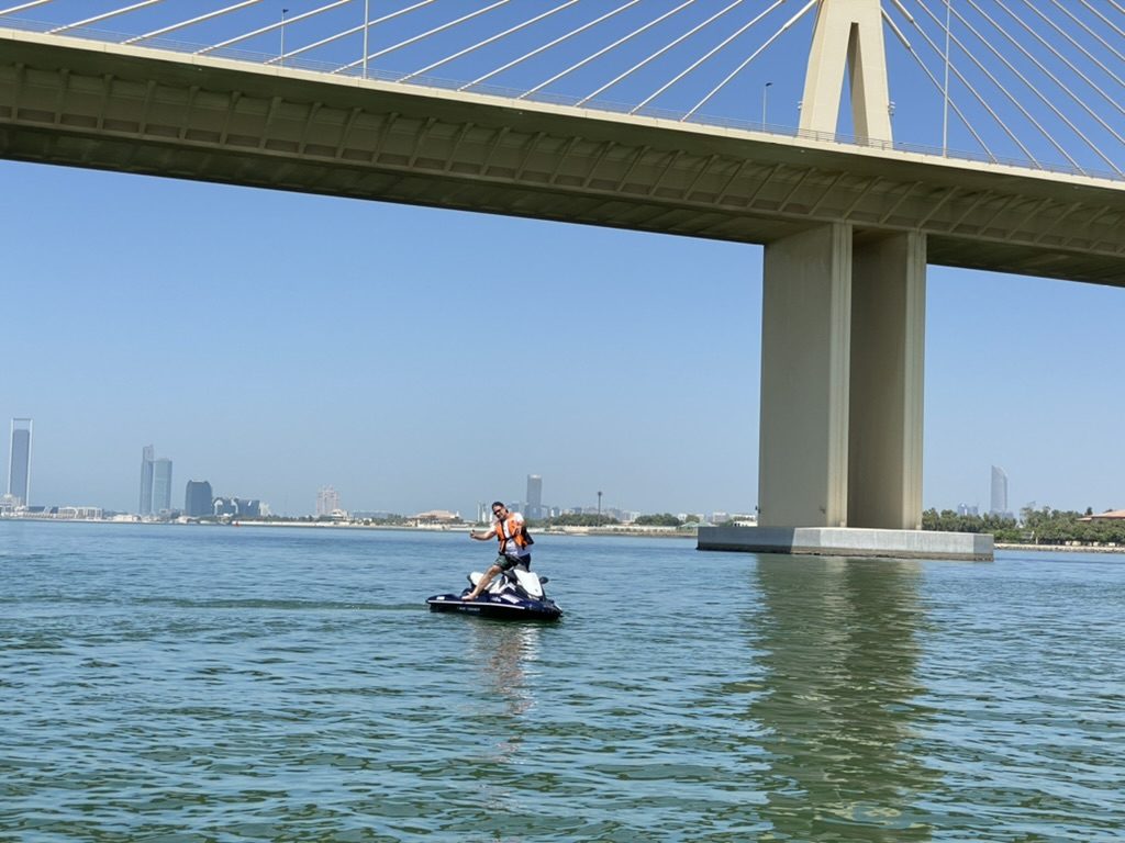 Rider by a bridge pylon
